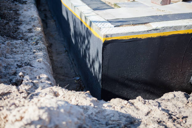 Professional Waterproofing technician working in Altoona, AL
